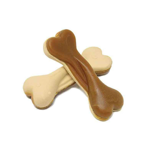 Two dog treats in the shape of bones on a white background.